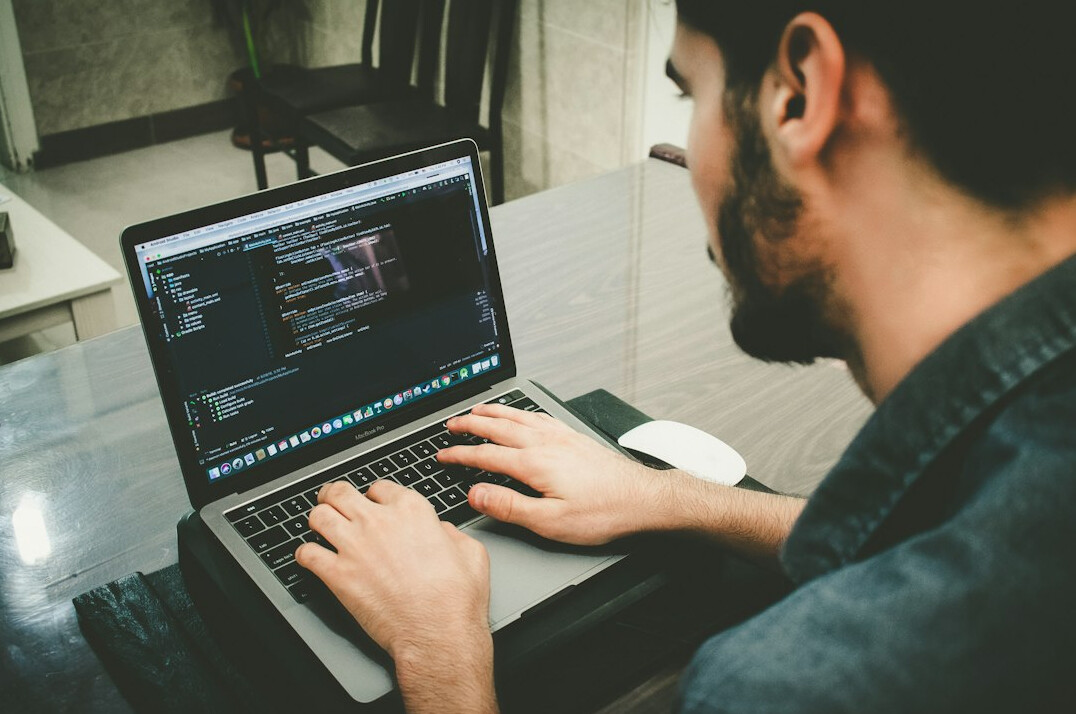 programmer working on computer