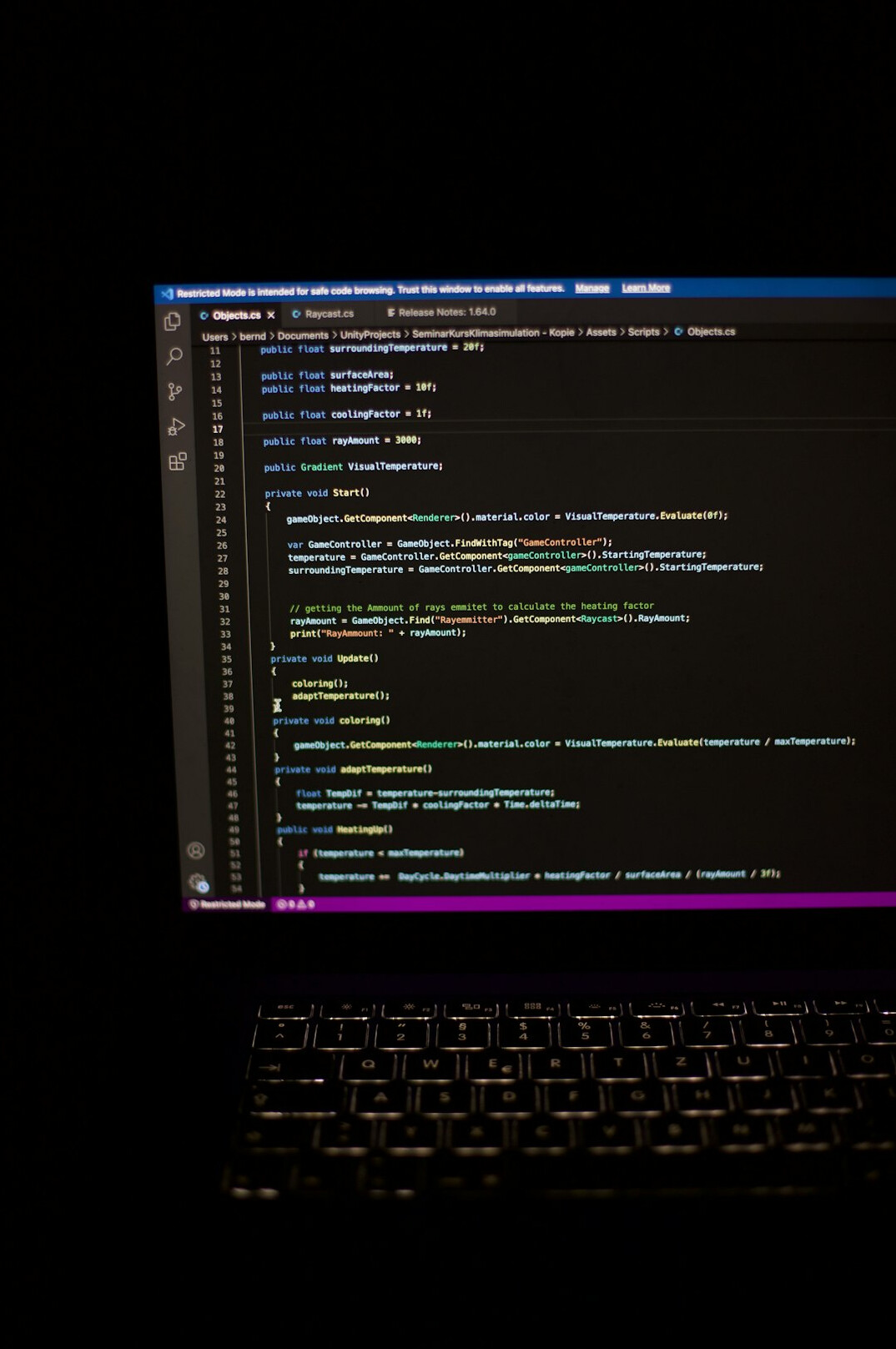 laptop screen showing code editor